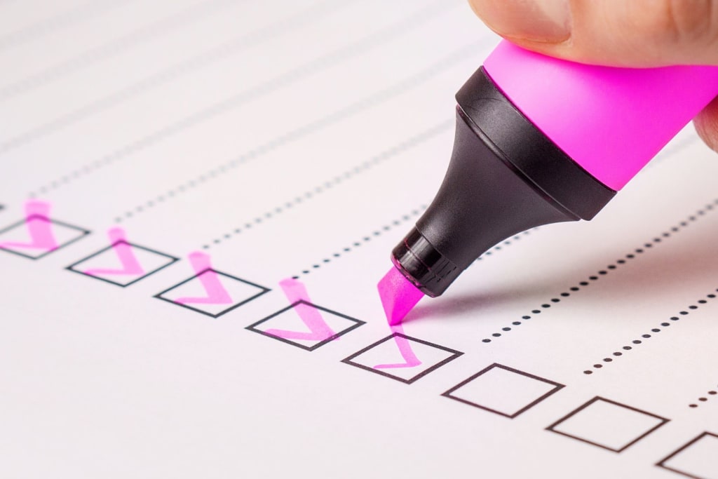 Highlighter marking a checkbox on a list.